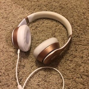 Rose gold beats headphones
